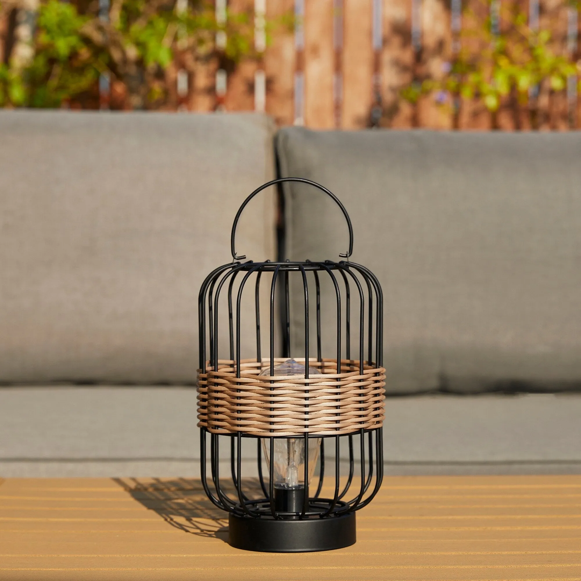 Glitzhome 11.75"H Metal & Faux Rattan Solar Powered Outdoor Lantern with Edison Bulb