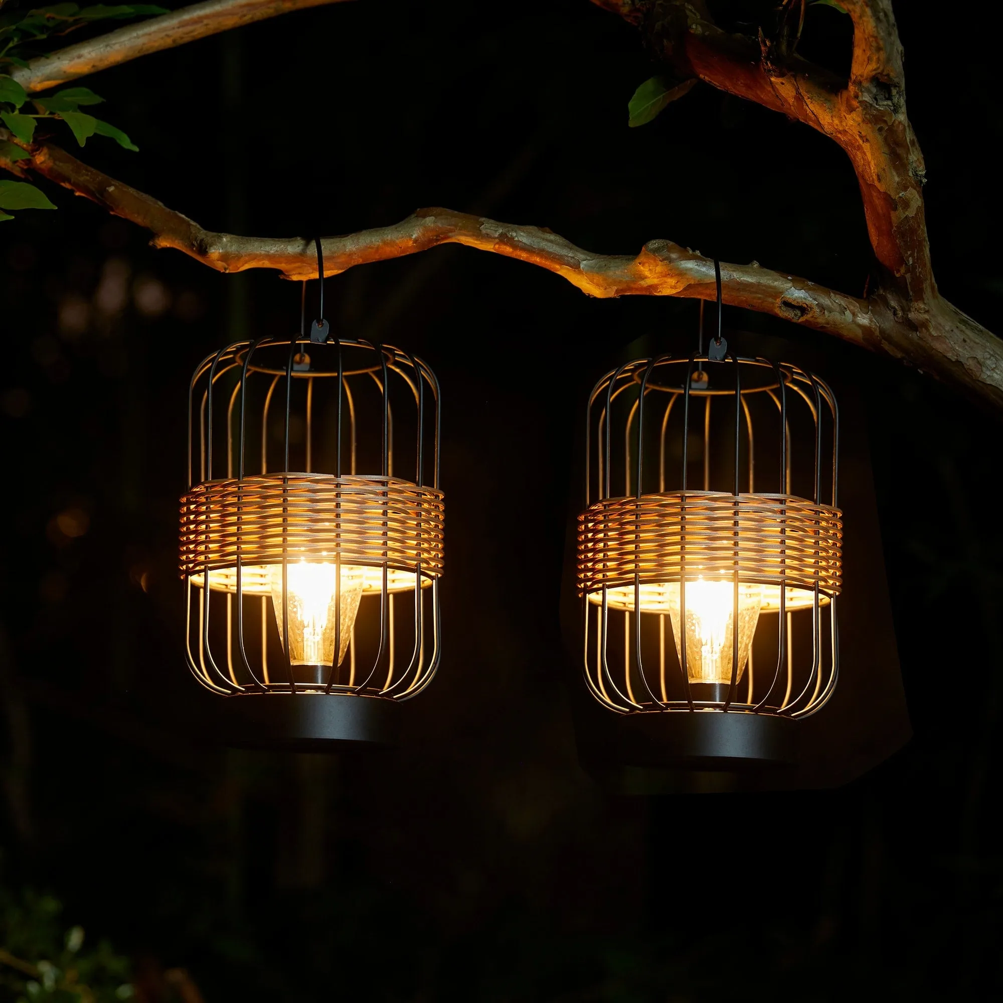 Glitzhome 11.75"H Metal & Faux Rattan Solar Powered Outdoor Lantern with Edison Bulb