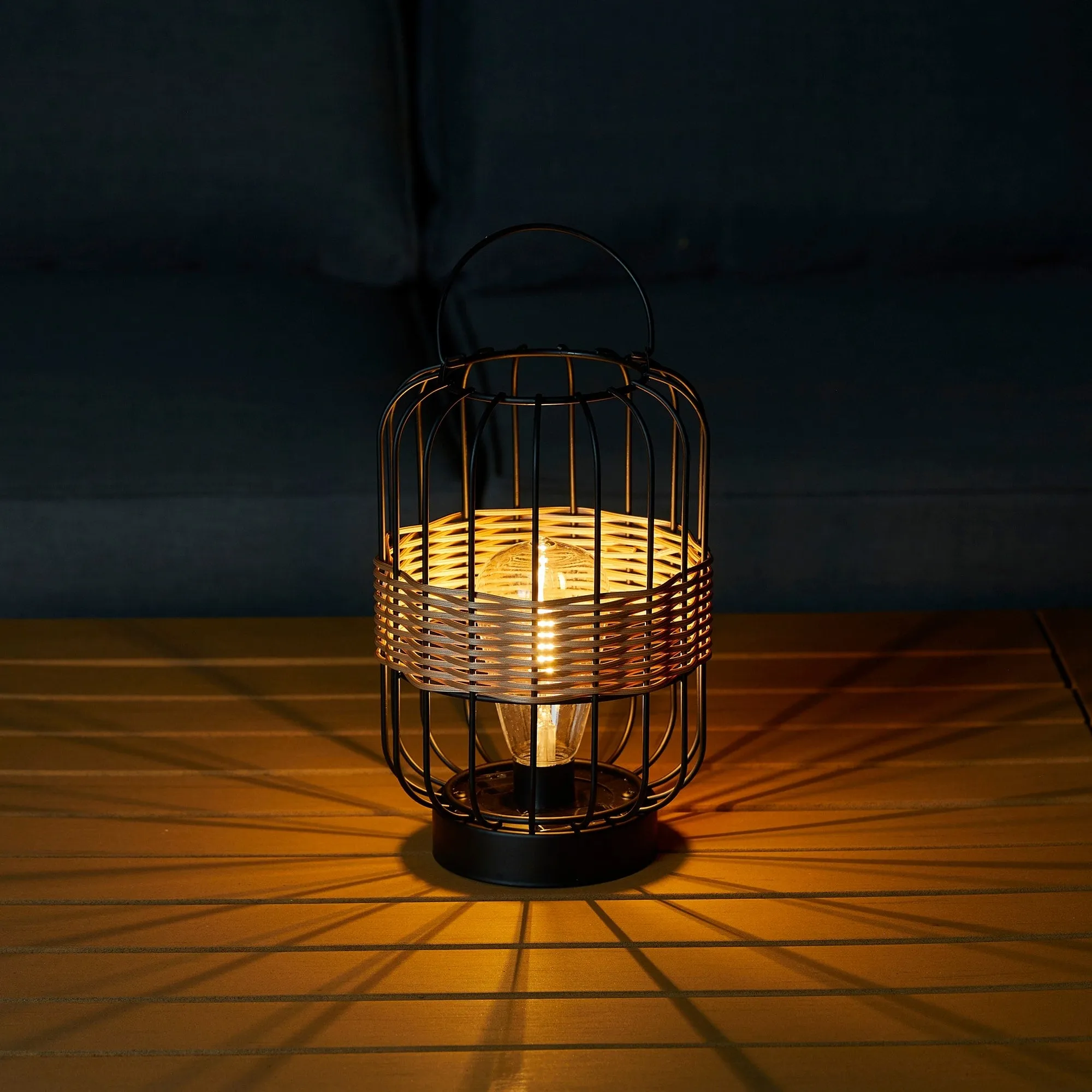Glitzhome 11.75"H Metal & Faux Rattan Solar Powered Outdoor Lantern with Edison Bulb