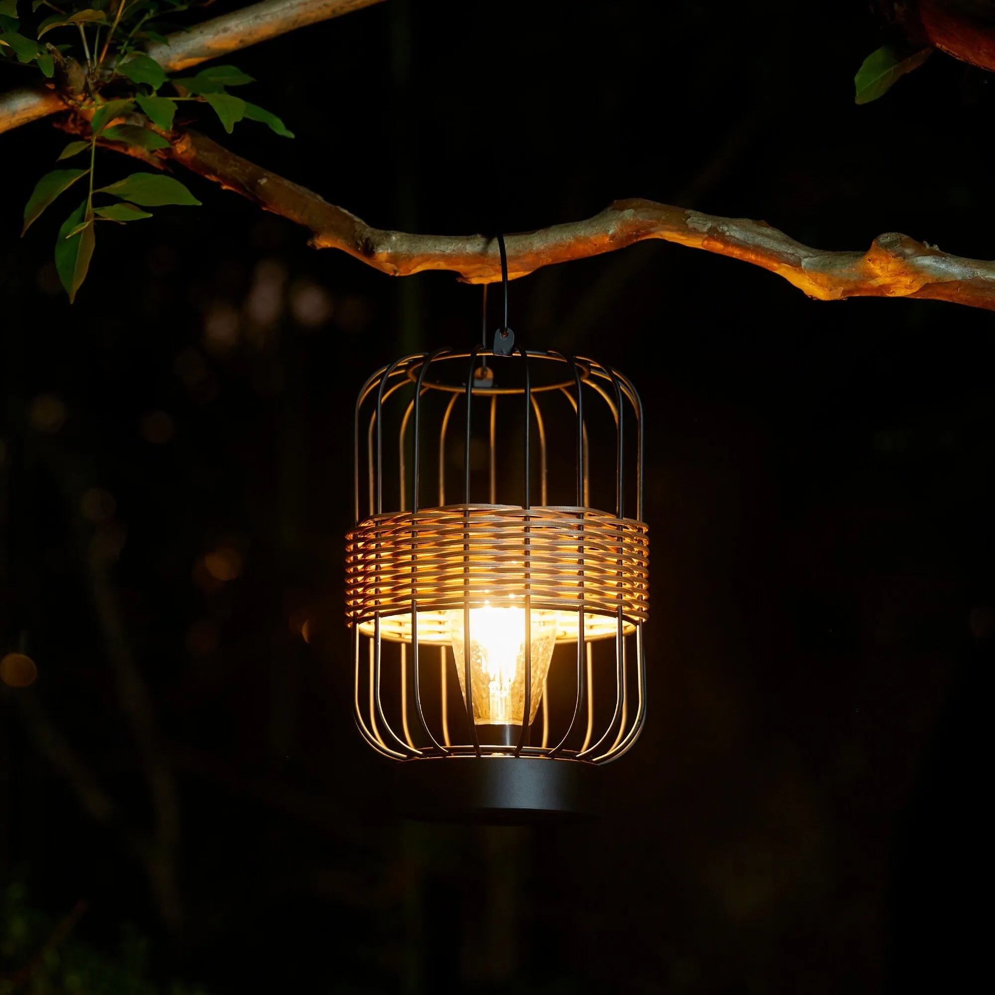 Glitzhome 11.75"H Metal & Faux Rattan Solar Powered Outdoor Lantern with Edison Bulb