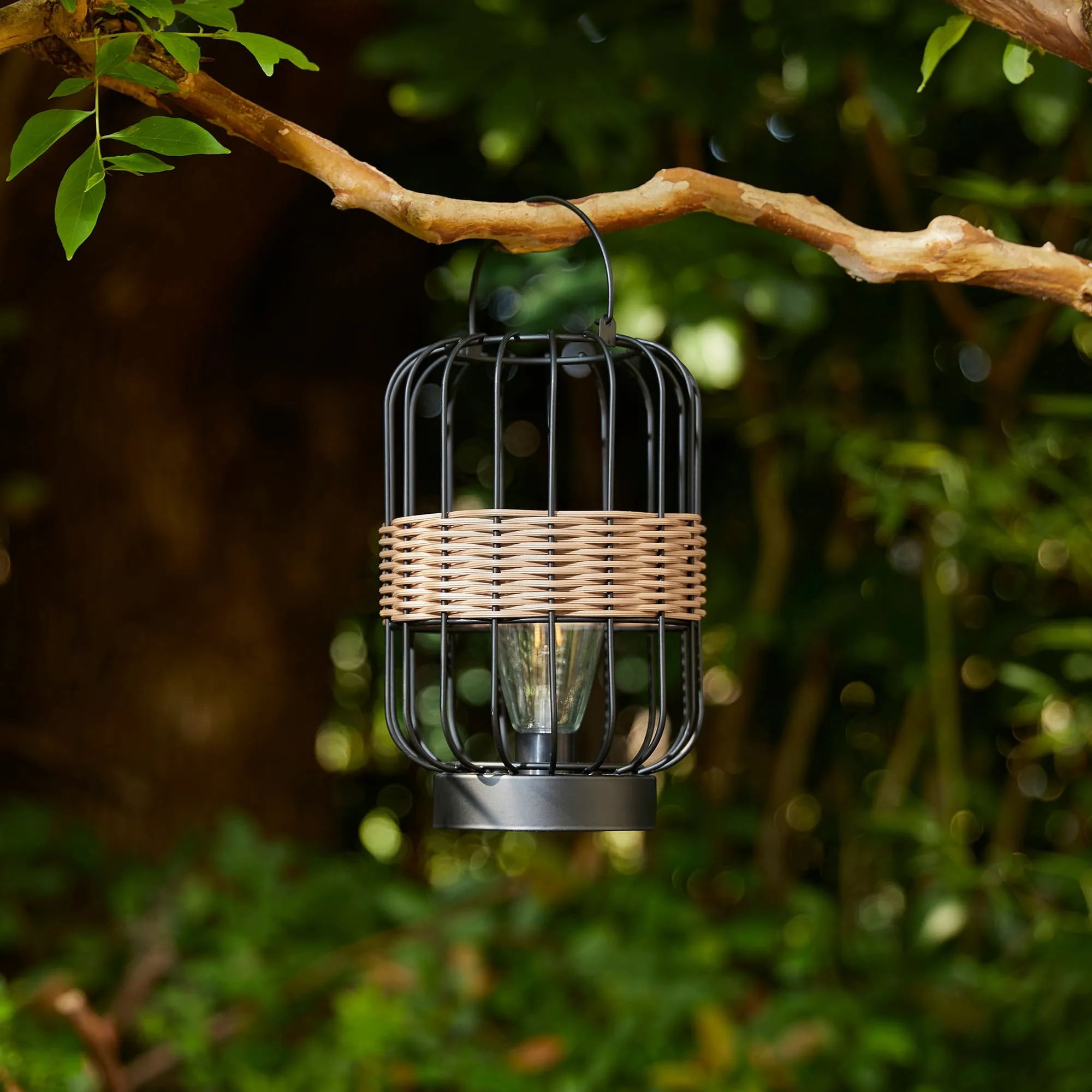 Glitzhome 11.75"H Metal & Faux Rattan Solar Powered Outdoor Lantern with Edison Bulb
