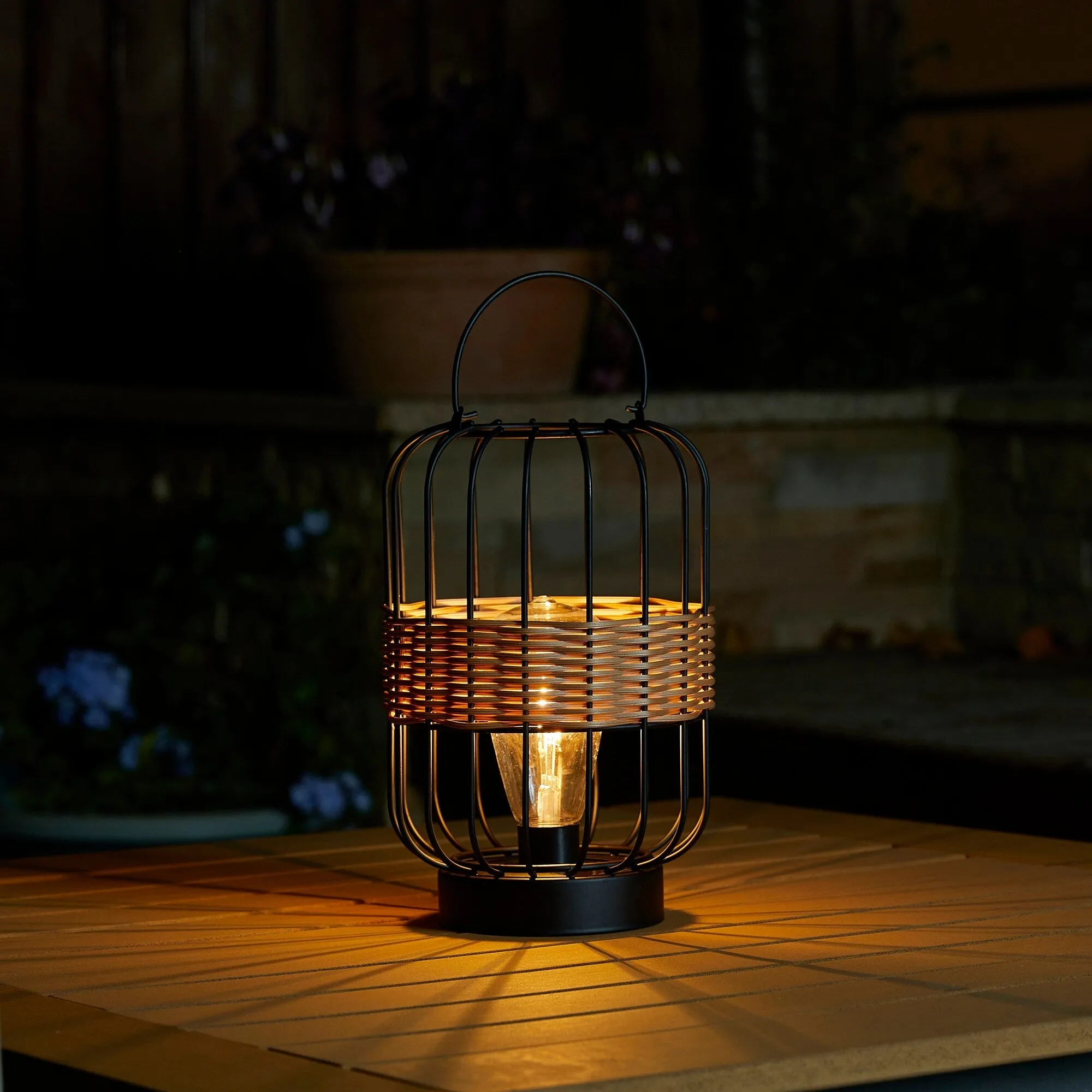 Glitzhome 11.75"H Metal & Faux Rattan Solar Powered Outdoor Lantern with Edison Bulb