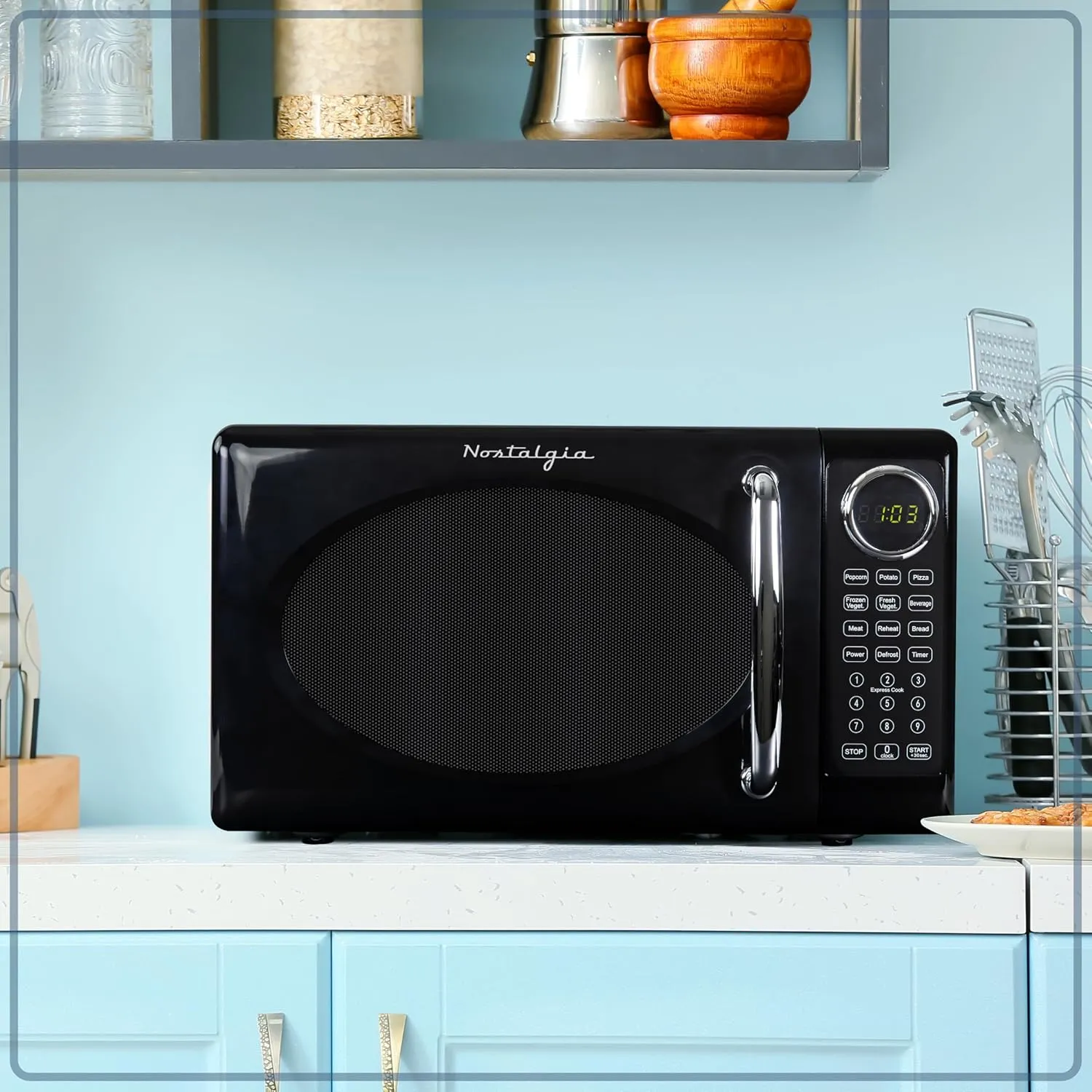 Nostalgia Retro Microwave Oven 0.7 Cu Ft, 700-Watt Countertop Size with Glass Turntable, Child Safety Lock, 8 Auto-Cook Programs, Digital Clock, Black