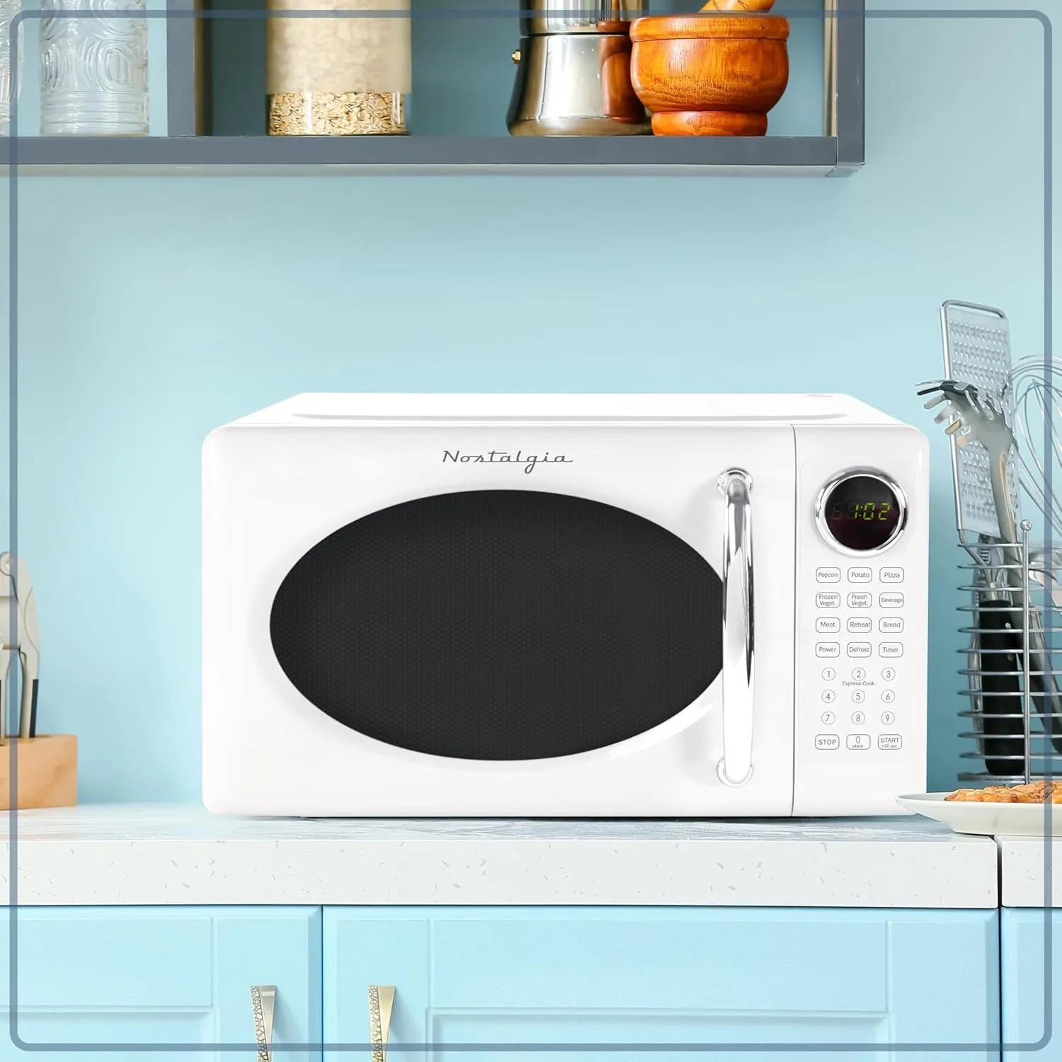Nostalgia Retro Microwave Oven 0.7 Cu Ft, 700-Watt Countertop Size with Glass Turntable, Child Safety Lock, 8 Auto-Cook Programs, Digital Clock, White